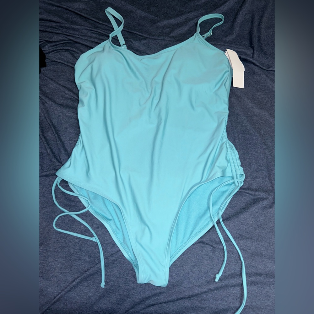 blue bathing suit, never been worn